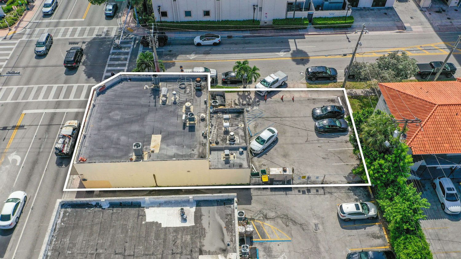 Aerial of the corner and on-site parking